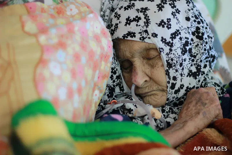 An elderly Palestinian woman sleeps as she receives treatment at El Wafa elderly nursing home, in Gaza city on Feb. 12, 2017. El Wafa elderly nursing home was established in 1980 as one of programs of Al-Wafa Charity Ass...