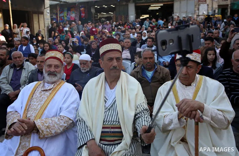 Palestinians Muslim Sufis attend a ceremony commemorating the Islamic holiday of Isra Mi'raj in the West Bank city of Nablus on April 24, 2017. The holiday marks what Muslims believe is Prophet Mohammad's journey from Me...