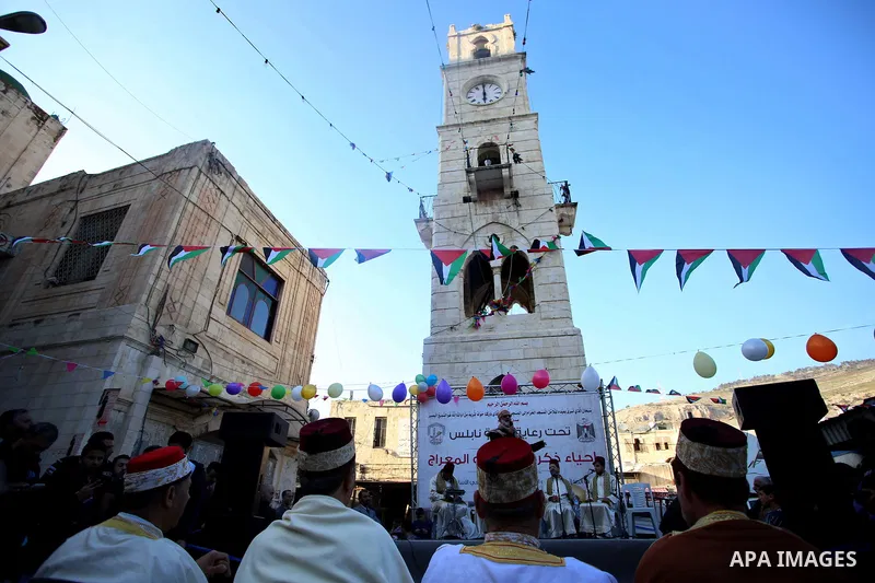 Palestinians Muslim Sufis attend a ceremony commemorating the Islamic holiday of Isra Mi'raj in the West Bank city of Nablus on April 24, 2017. The holiday marks what Muslims believe is Prophet Mohammad's journey from Me...