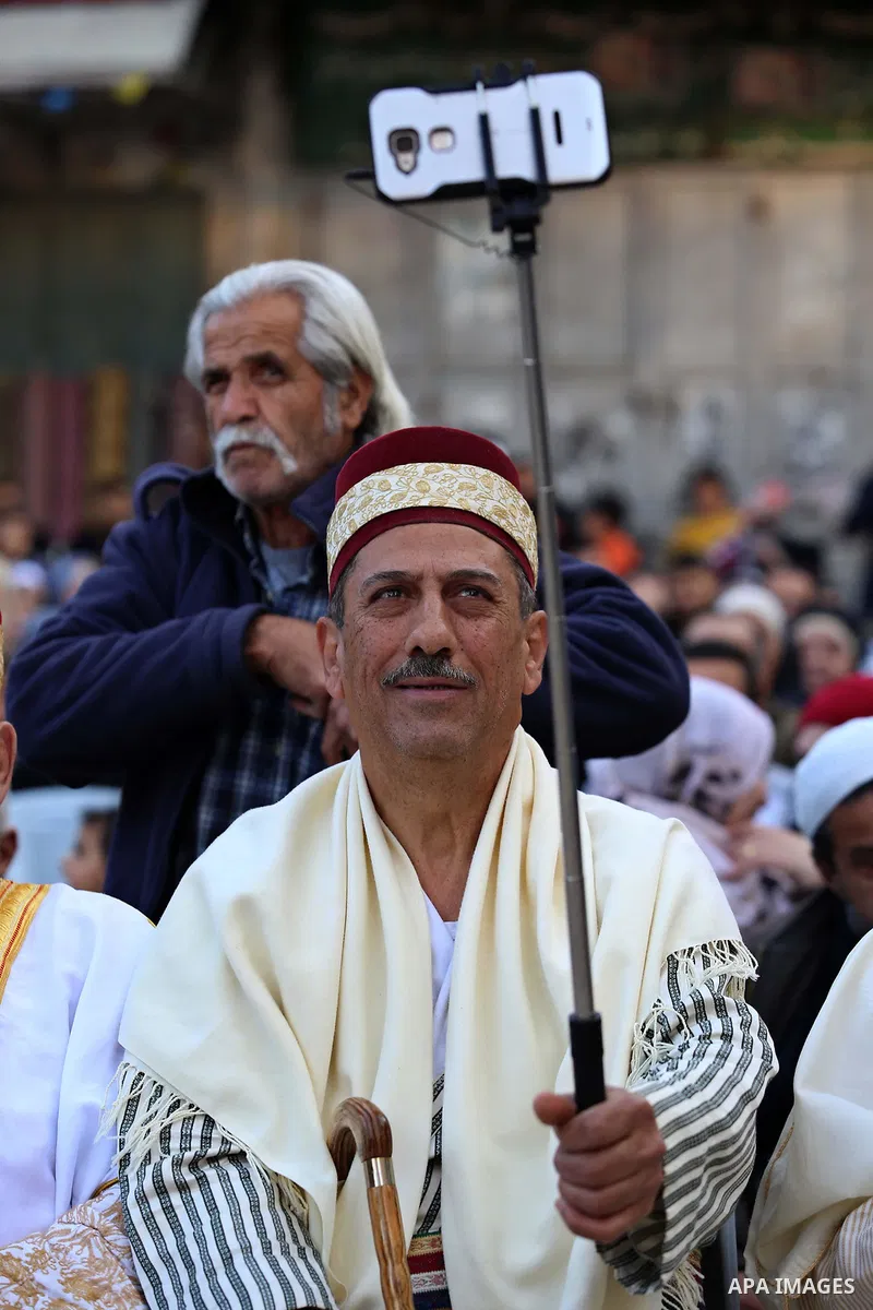 Palestinians Muslim Sufis attend a ceremony commemorating the Islamic holiday of Isra Mi'raj in the West Bank city of Nablus on April 24, 2017. The holiday marks what Muslims believe is Prophet Mohammad's journey from Me...