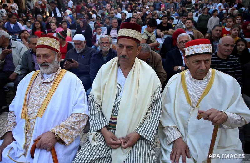 Palestinians Muslim Sufis attend a ceremony commemorating the Islamic holiday of Isra Mi'raj in the West Bank city of Nablus on April 24, 2017. The holiday marks what Muslims believe is Prophet Mohammad's journey from Me...