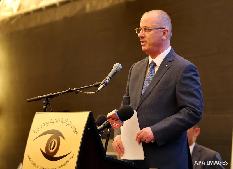Palestinian Prime Minister Rami Hamdallah speaks during Third annual conference of State Audit and Administrative Control Bureau, in the West Bank city of Ramallah on April 26, 2017. Photo by Prime Minister Office
