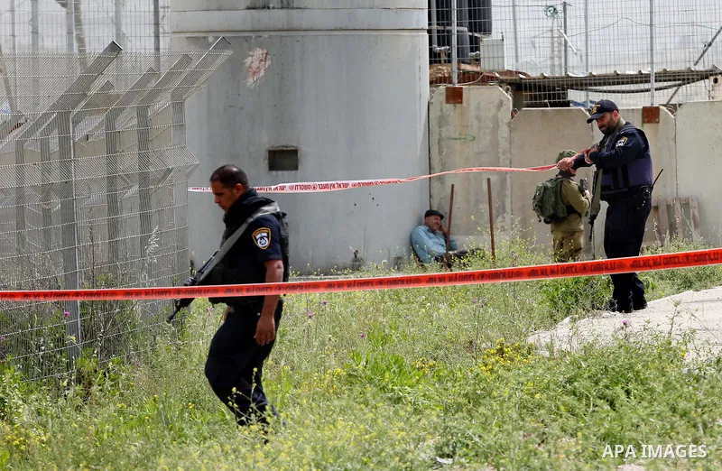 Israeli security forces gather at the site where a Palestinian teenager attempted to stab an Israeli soldier before being shot, at the Hawara checkpoint near the West Bank city of Nablus, on April 26, 2017. A Palestinian...
