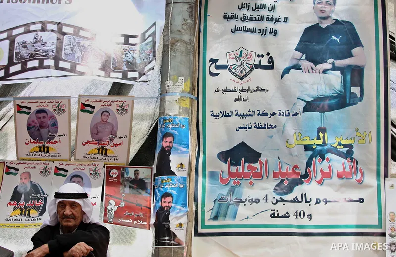 A Palestinian man takes part at a protest tent in support of Palestinian prisoners on hunger strike in Israeli jails, in the West Bank city of Nablus on April 26, 2017. Photo by Ayman Ameen