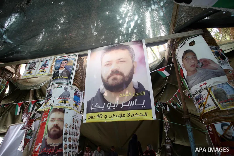 Palestinians take part at a protest tent in support of Palestinian prisoners on hunger strike in Israeli jails, in the West Bank city of Nablus on April 26, 2017. Photo by Ayman Ameen