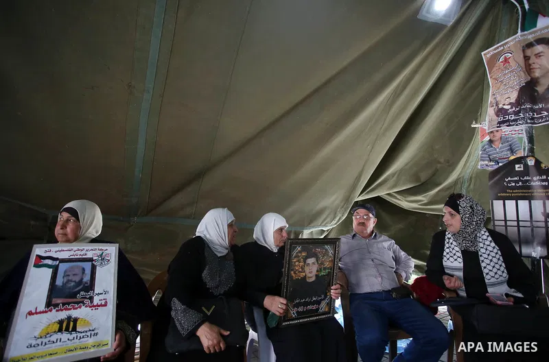 Palestinians take part at a protest tent in support of Palestinian prisoners on hunger strike in Israeli jails, in the West Bank city of Nablus on April 26, 2017. Photo by Ayman Ameen