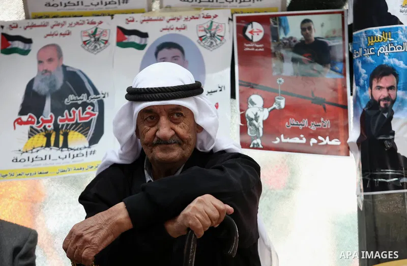 A Palestinian man takes part at a protest tent in support of Palestinian prisoners on hunger strike in Israeli jails, in the West Bank city of Nablus on April 26, 2017. Photo by Ayman Ameen