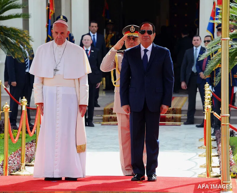 Egyptian President Abdel Fattah al-Sisi greets Pope Francis upon the latter's arrival at the presidential palace in Cairo, during an official visit to Egypt on April 28, 2017. Pope Francis began a visit to Egypt to promo...