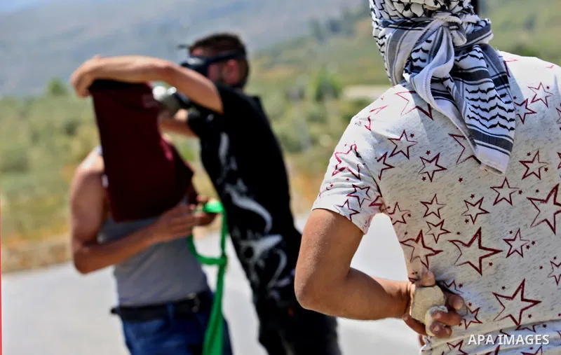 Palestinian protesters clash with Israeli security forces at a protest in support of Palestinian prisoners on hunger strike in Israeli jails, in the West Bank village of al-Naqoura, near Nablus on April 28, 2017. Photo b...