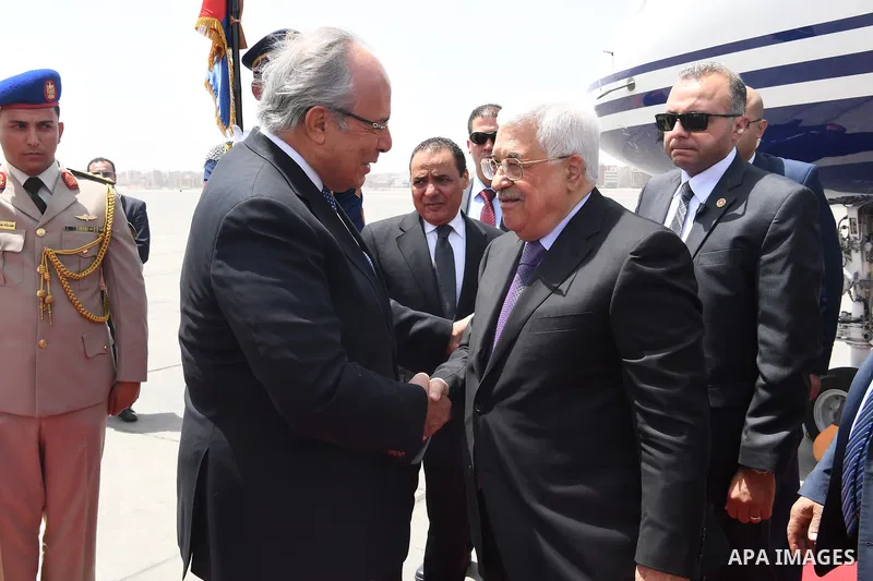 Palestinian President Mahmoud Abbas upon his arrival in Cairo, Egypt on April 29, 2017. Photo by Osama Falah