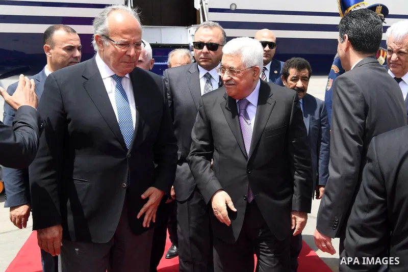 Palestinian President Mahmoud Abbas upon his arrival in Cairo, Egypt on April 29, 2017. Photo by Osama Falah