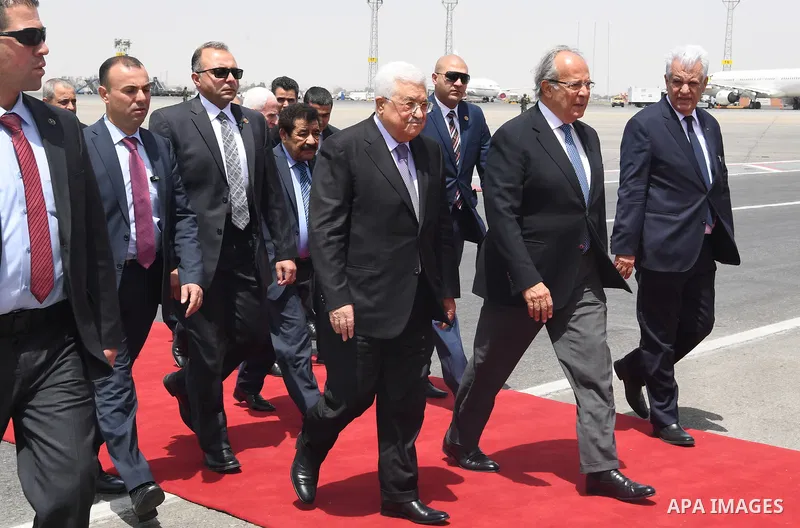 Palestinian President Mahmoud Abbas upon his arrival in Cairo, Egypt on April 29, 2017. Photo by Osama Falah