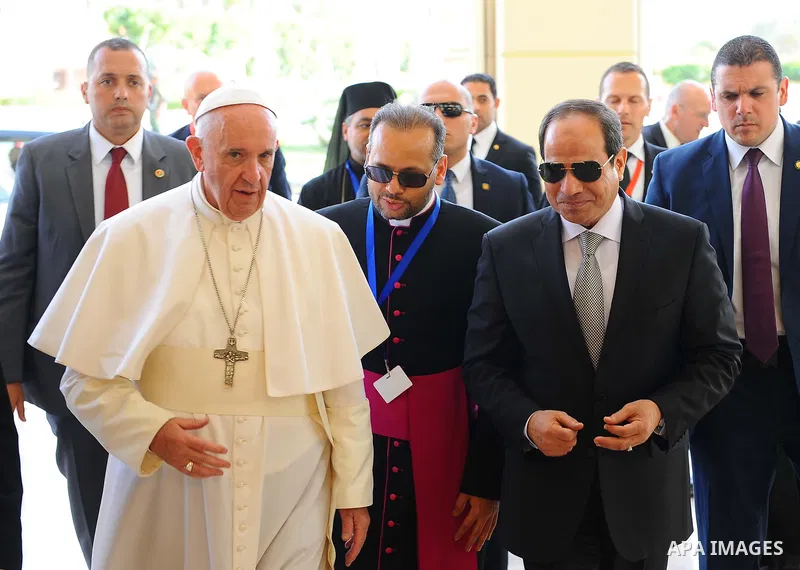 Egyptian President Abdel Fattah Sisi bids farewell to Pope Francis at Cairo International Airport in Cairo on April 29, 2017. Pope Francis led a jubilant mass for thousands of Egyptian Catholics during a visit to support...
