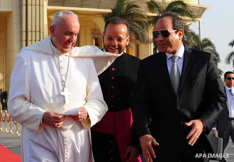 Egyptian President Abdel Fattah Sisi bids farewell to Pope Francis at Cairo International Airport in Cairo on April 29, 2017. Pope Francis led a jubilant mass for thousands of Egyptian Catholics during a visit to support...