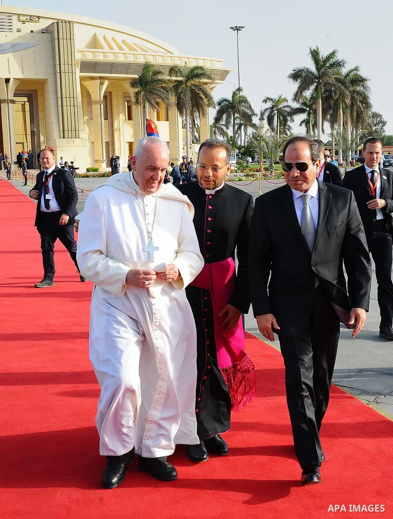 Egyptian President Abdel Fattah Sisi bids farewell to Pope Francis at Cairo International Airport in Cairo on April 29, 2017. Pope Francis led a jubilant mass for thousands of Egyptian Catholics during a visit to support...