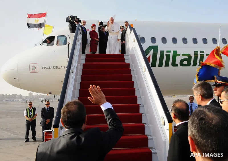 Egyptian President Abdel Fattah Sisi bids farewell to Pope Francis at Cairo International Airport in Cairo on April 29, 2017. Pope Francis led a jubilant mass for thousands of Egyptian Catholics during a visit to support...