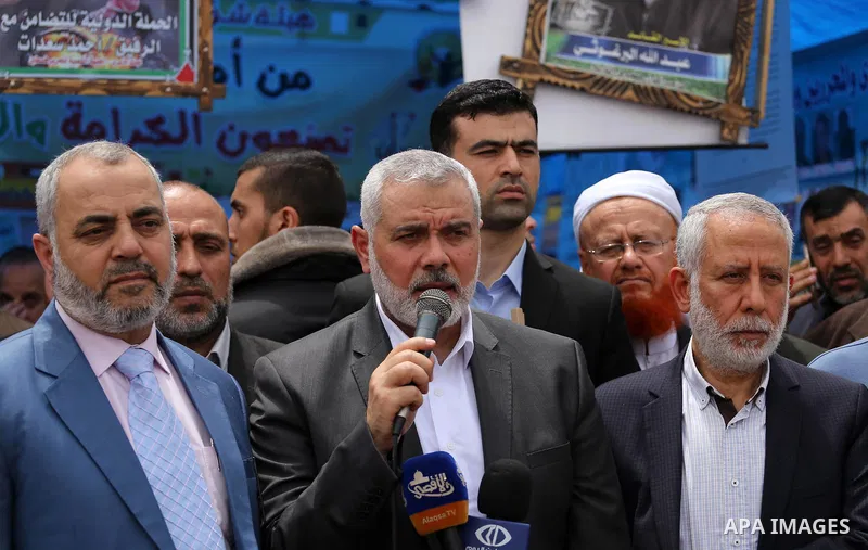 Senior political leaders of the Islamist movement, Ismail Haniyeh delivers a speech as he takes part at a protest to show solidarity with Palestinian prisoners on hunger strike in Israeli jails, in Gaza city on April 30,...