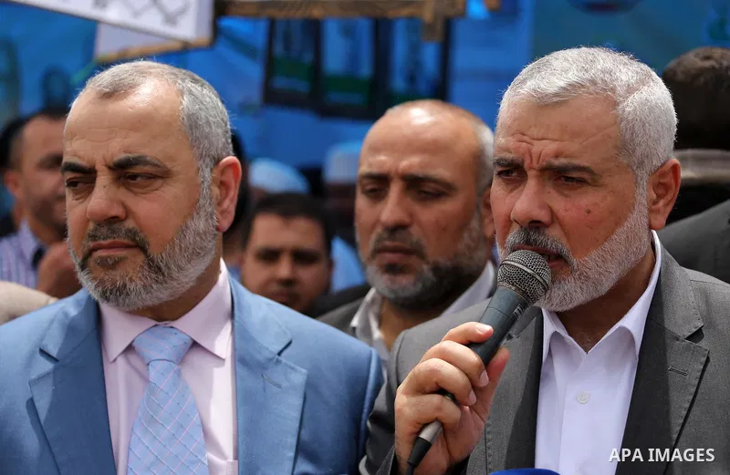 Senior political leaders of the Islamist movement, Ismail Haniyeh delivers a speech as he takes part at a protest to show solidarity with Palestinian prisoners on hunger strike in Israeli jails, in Gaza city on April 30,...