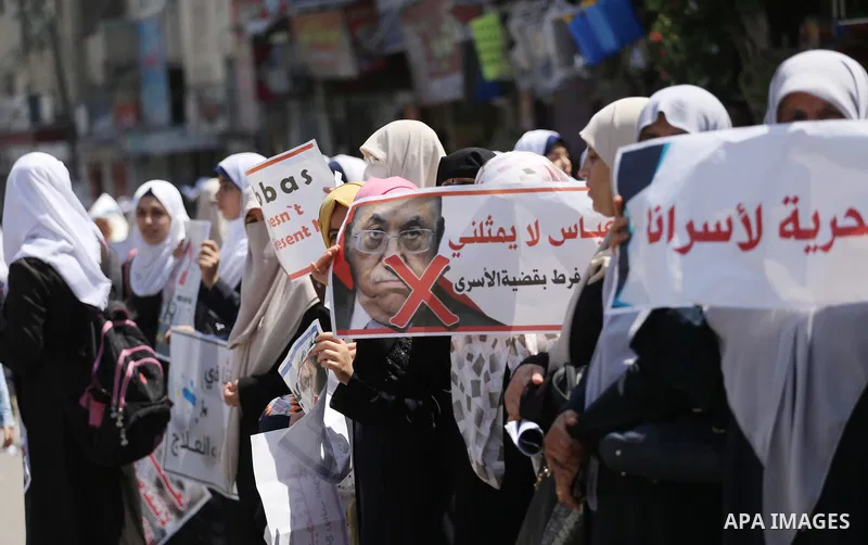 Palestinians take part in a protest against the blockade on Gaza, in the central Gaza Strip May 2, 2017. Photo by Mohammed Asad