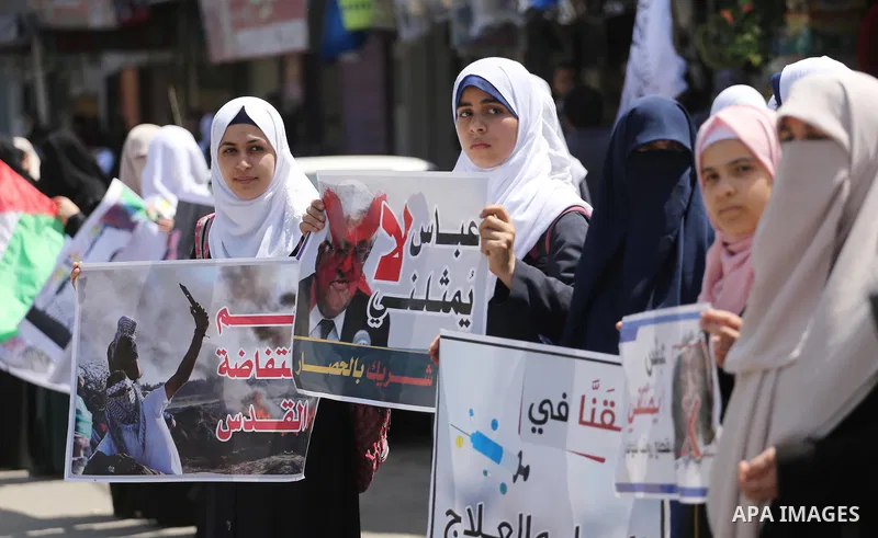 Palestinians take part in a protest against the blockade on Gaza, in the central Gaza Strip May 2, 2017. Photo by Mohammed Asad