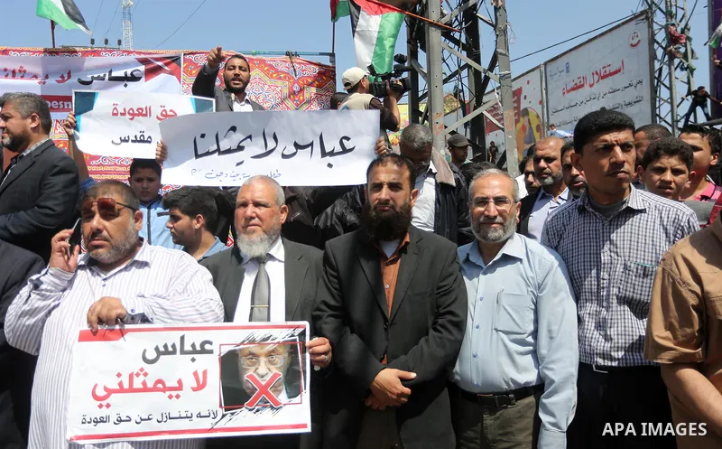 Palestinians take part in a protest against the blockade on Gaza, in the central Gaza Strip May 2, 2017. Photo by Mohammed Asad