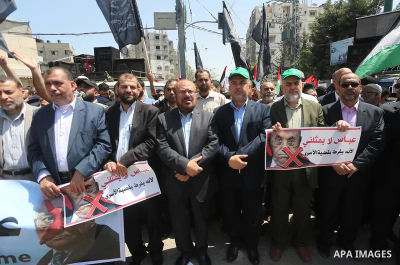 Palestinians take part in a protest against the blockade on Gaza, in the central Gaza Strip May 2, 2017. Photo by Mohammed Asad