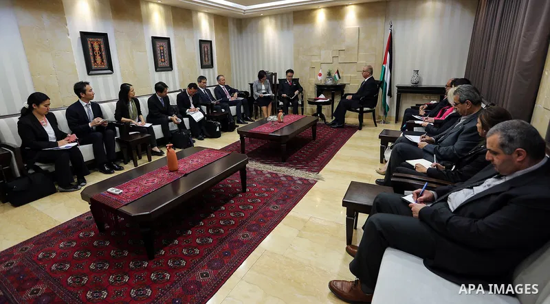 Palestinian Prime Minister Rami Hamdallah meets with Japanese State Minister of Economy, Trade and Industry Hiroshige Seko in the West Bank city of Ramallah on May 02, 2017. Photo by Prime Minister Office