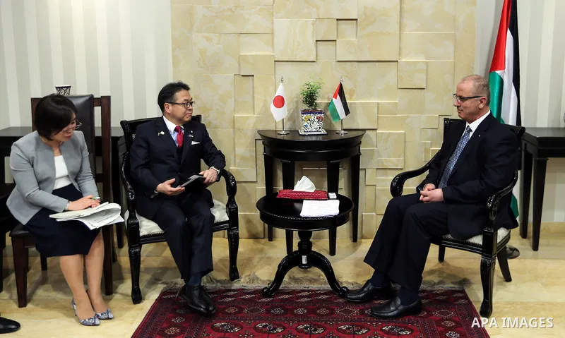 Palestinian Prime Minister Rami Hamdallah meets with Japanese State Minister of Economy, Trade and Industry Hiroshige Seko in the West Bank city of Ramallah on May 02, 2017. Photo by Prime Minister Office