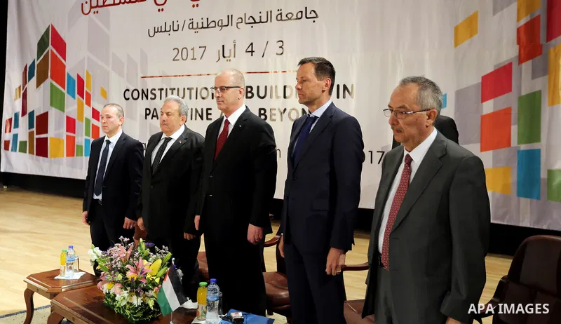 Palestinian Prime Minister Rami Hamdallah attends the conference of constitutional building in Palestine and beyond, at An-Najah national University in the West Bank city of Nablus on May 03, 2017. Photo by Prime Ministe...