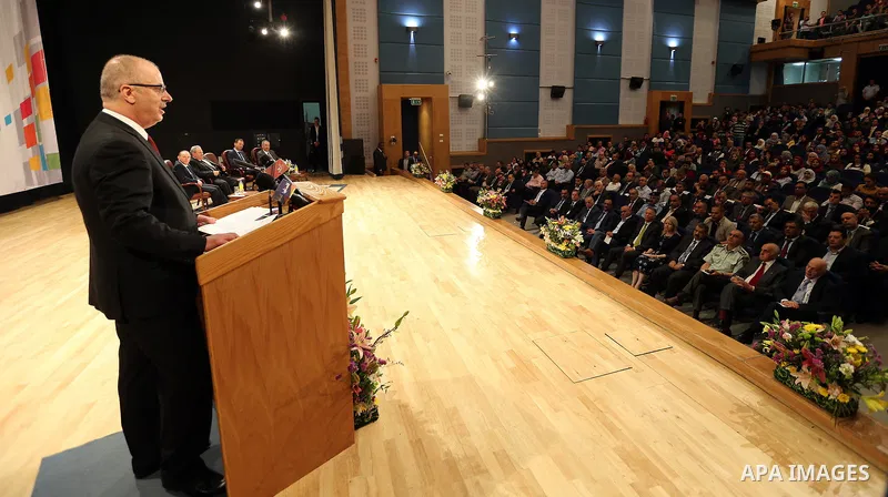 Palestinian Prime Minister Rami Hamdallah speaks during the conference of constitutional building in Palestine and beyond, at An-Najah national University in the West Bank city of Nablus on May 03, 2017. Photo by Prime M...