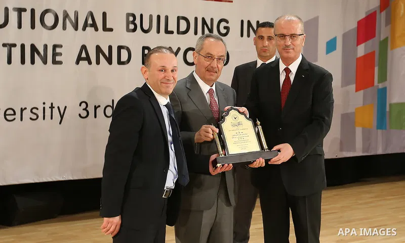 Palestinian Prime Minister Rami Hamdallah attends the conference of constitutional building in Palestine and beyond, at An-Najah national University in the West Bank city of Nablus on May 03, 2017. Photo by Prime Ministe...