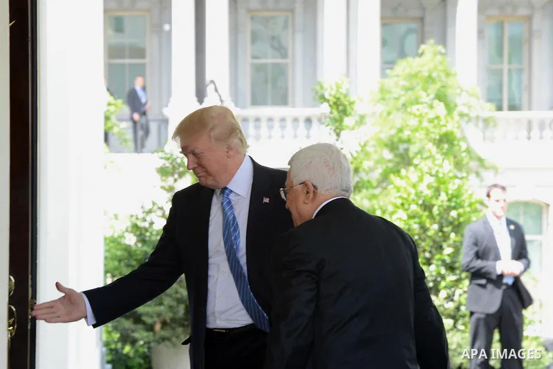 US President Donald Trump greets Palestinian President Mahmoud Abbas at the White House in Washington, DC, on May 3, 2017. Photo by Thaer Ganaim