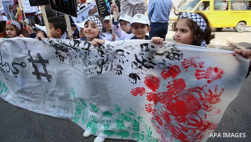 Palestinian children take part in a protest to show solidarity with Palestinian prisoners on hunger strike in Israeli jails, in the West Bank city of Nablus, on May 4, 2017. Photo by Ayman Ameen