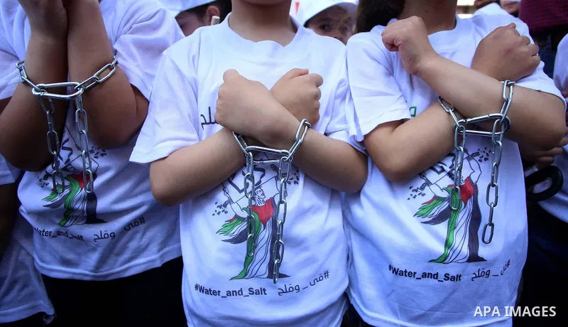 Palestinian children take part in a protest to show solidarity with Palestinian prisoners on hunger strike in Israeli jails, in the West Bank city of Nablus, on May 4, 2017. Photo by Ayman Ameen