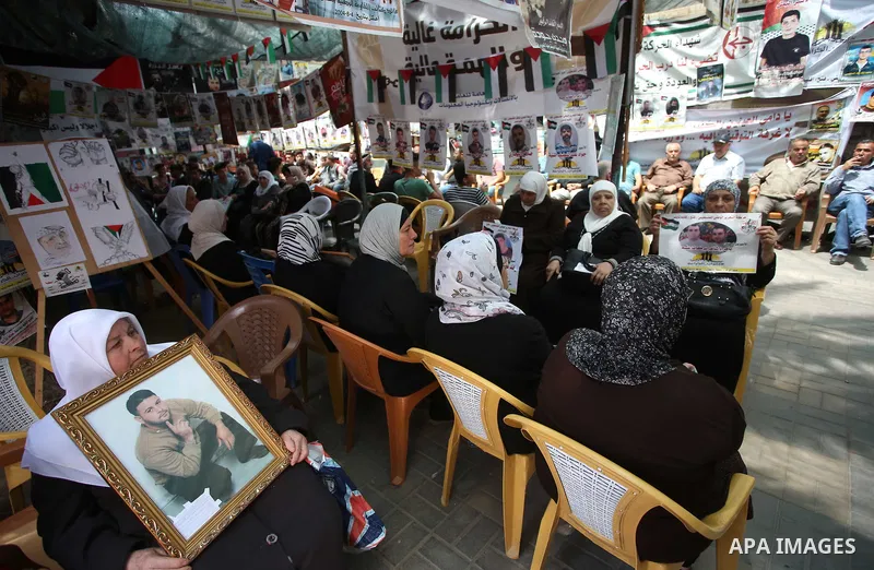 Palestinian women take part at a protest tent in support of Palestinian prisoners on hunger strike in Israeli jails, in the West Bank city of Nablus, on May 4, 2017. Photo by Ayman Ameen