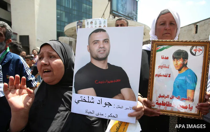 Palestinian women take part at a protest tent in support of Palestinian prisoners on hunger strike in Israeli jails, in the West Bank city of Nablus, on May 4, 2017. Photo by Ayman Ameen