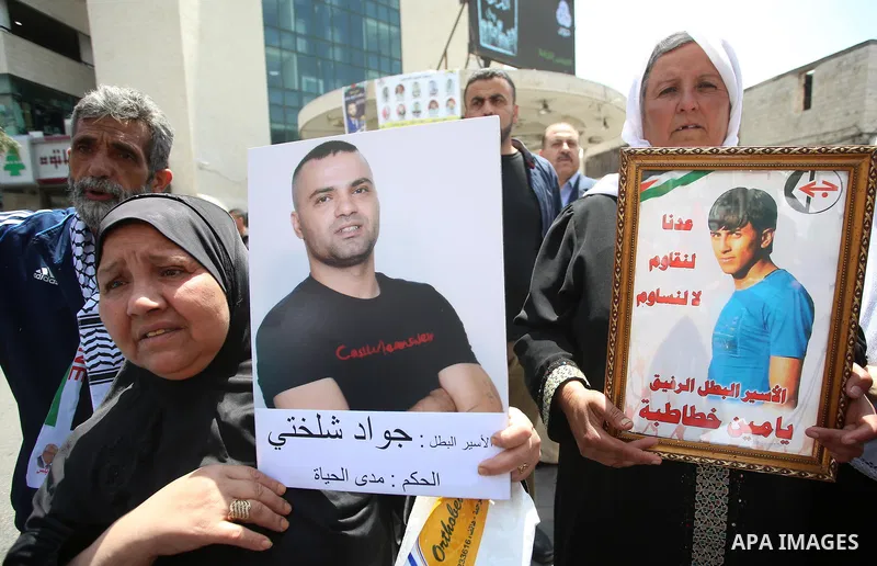 Palestinian women take part at a protest tent in support of Palestinian prisoners on hunger strike in Israeli jails, in the West Bank city of Nablus, on May 4, 2017. Photo by Ayman Ameen