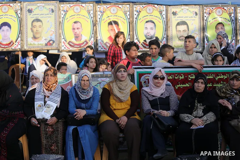 Palestinians attend a concert held in solidarity with Palestinian hunger-striking prisoners in Israeli jails, in Gaza City on May 4, 2017. Photo by Mohammed Asad
