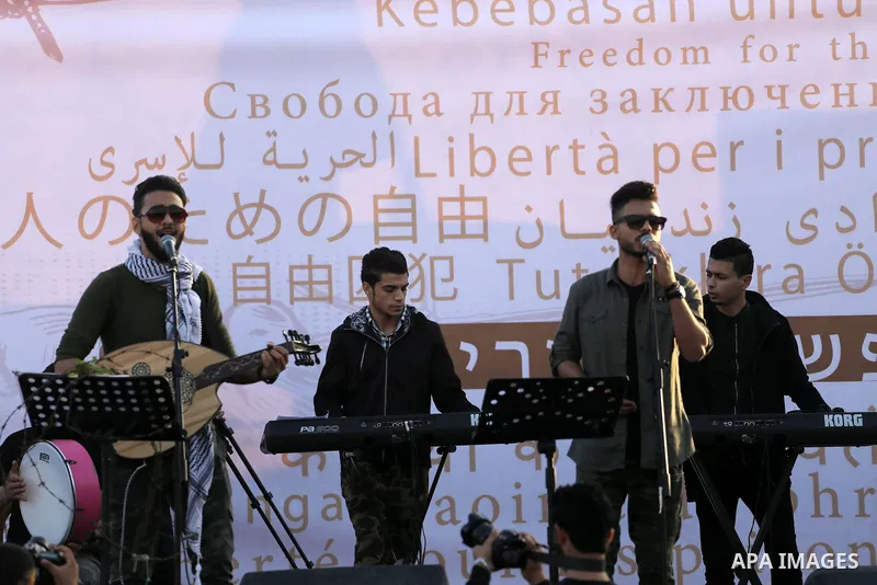 Musicians perform during a concert held in solidarity with Palestinian hunger-striking prisoners in Israeli jails, in Gaza City on May 4, 2017. Photo by Mohammed Asad