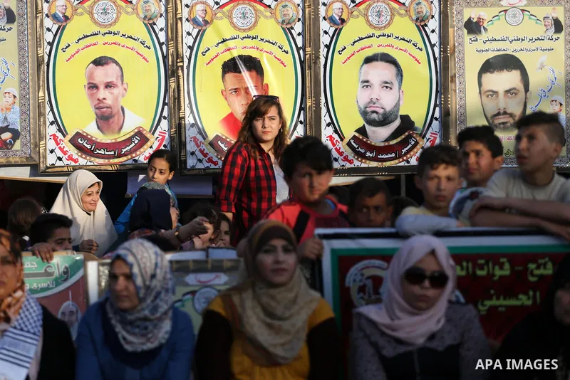 Palestinians attend a concert held in solidarity with Palestinian hunger-striking prisoners in Israeli jails, in Gaza City on May 4, 2017. Photo by Mohammed Asad