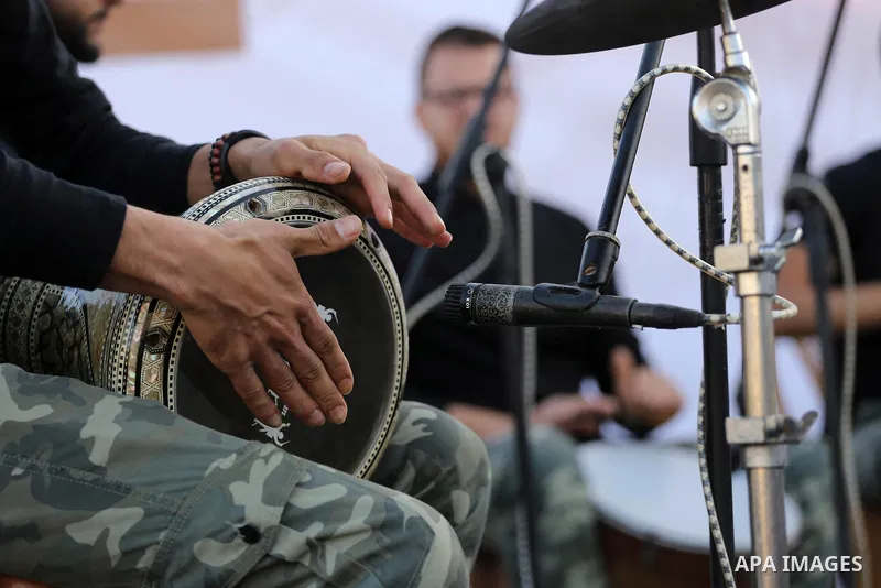 Musicians perform during a concert held in solidarity with Palestinian hunger-striking prisoners in Israeli jails, in Gaza City on May 4, 2017. Photo by Mohammed Asad