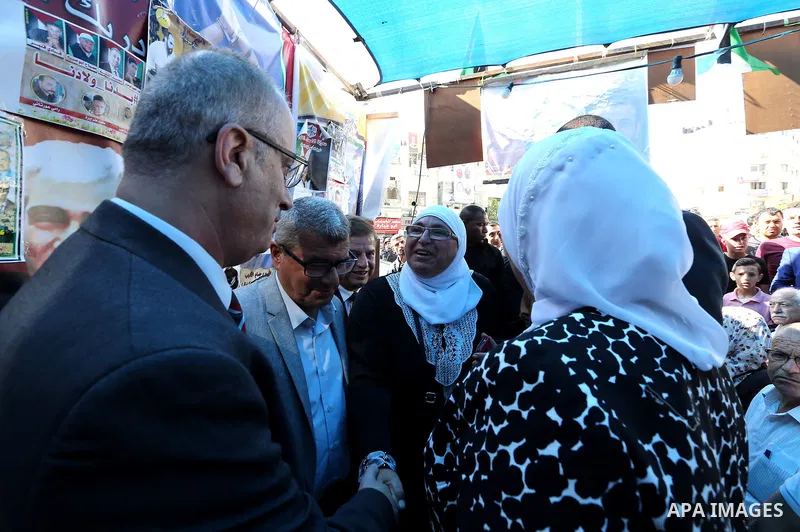 Palestinian Prime Minister Rami Hamdallah takes part at a protest tent in solidarity with Palestinian hunger-striking prisoners in Israeli jails, in the West Bank city of Ramallah on May 4, 2017. Photo by Prime Minister...