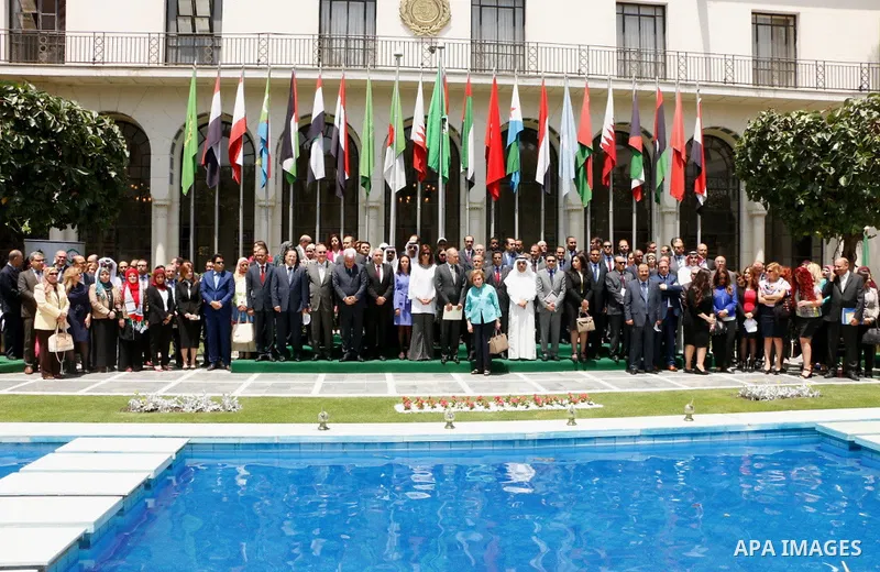 Arab League representatives and officials pose for a photo during an event held in solidarity with Palestinian hunger-striking prisoners in Israeli jails, at the Arab League headquarters, in the Egyptian capital Cairo, o...