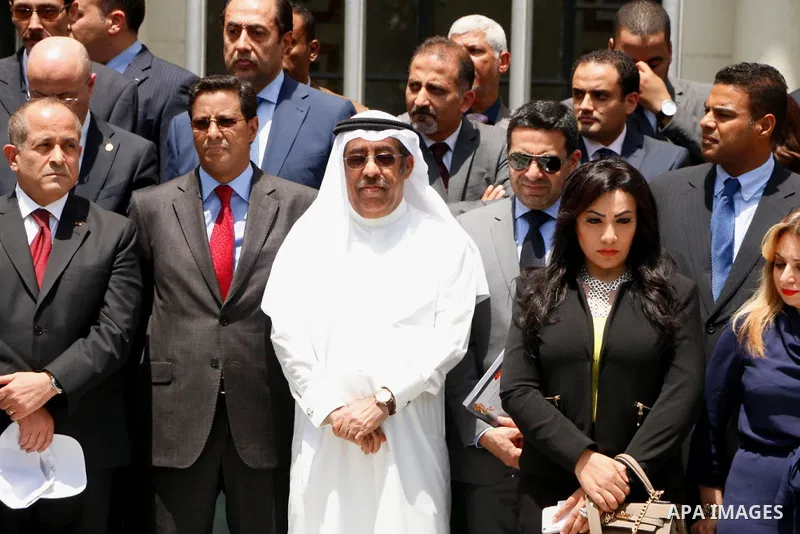 Arab League representatives and officials pose for a photo during an event held in solidarity with Palestinian hunger-striking prisoners in Israeli jails, at the Arab League headquarters, in the Egyptian capital Cairo, o...