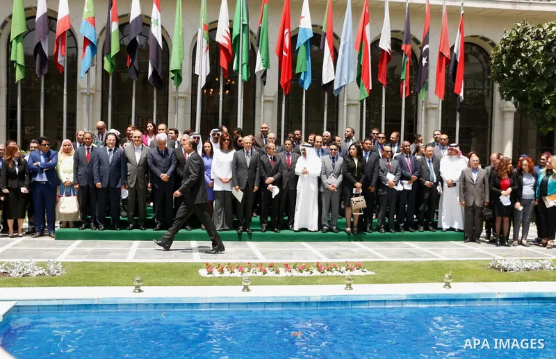 Arab League representatives and officials pose for a photo during an event held in solidarity with Palestinian hunger-striking prisoners in Israeli jails, at the Arab League headquarters, in the Egyptian capital Cairo, o...