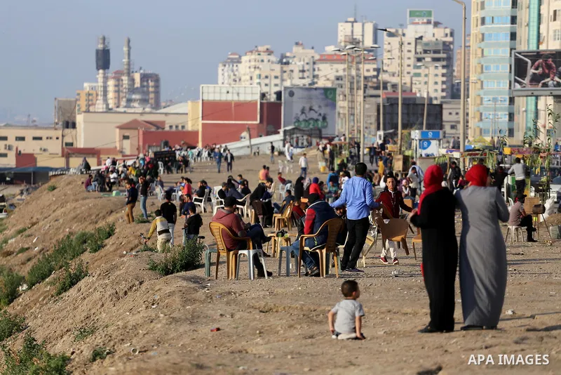 Palestinians enjoy their time off the beach of Gaza City on May 5, 2017. Photo by Mohammed Asad