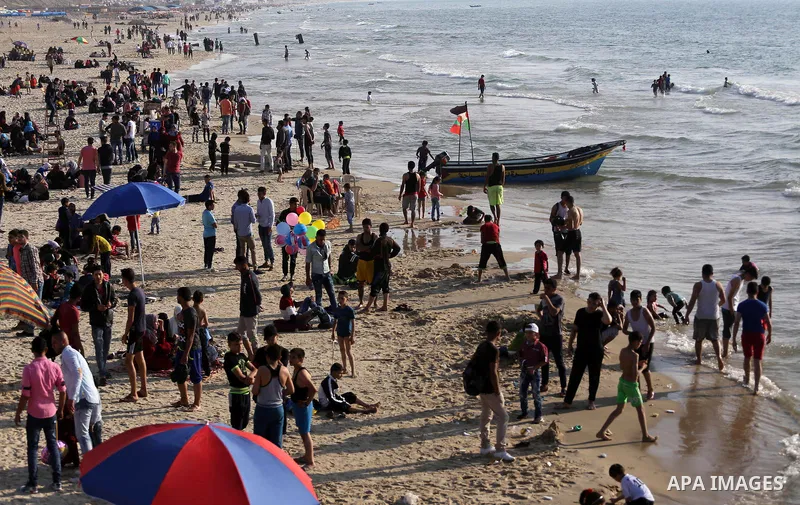 Palestinians enjoy their time off the beach of Gaza City on May 5, 2017. Photo by Mohammed Asad
