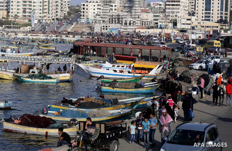Palestinians enjoy their time off the beach of Gaza City on May 5, 2017. Photo by Mohammed Asad