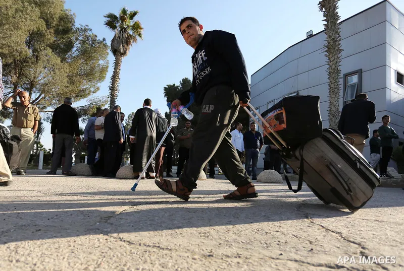 Palestinians arrival at Rafah crossing after it was opened by Egyptian authorities to allow stranded Palestinians to return to Gaza, in the southern Gaza Strip May 6, 2017. Photo by Ashraf Amra