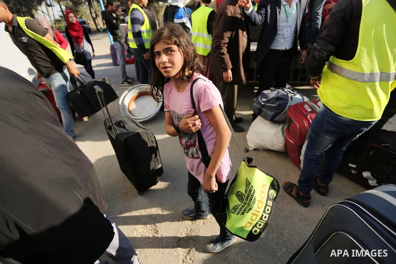 Palestinians arrival at Rafah crossing after it was opened by Egyptian authorities to allow stranded Palestinians to return to Gaza, in the southern Gaza Strip May 6, 2017. Photo by Ashraf Amra